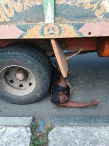 Woman Begs Trailer Driver To Crush Her To Death After Her Goods Were Seized By Government Officials In Calabar