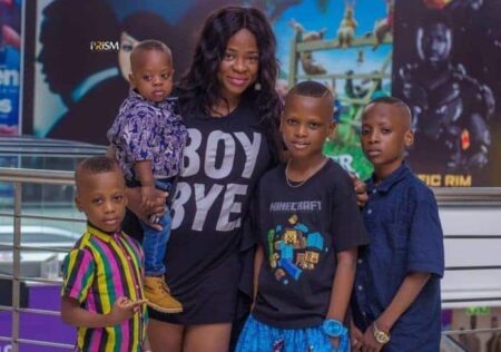 kunle afo's wife and their boys in a 2018 family picture