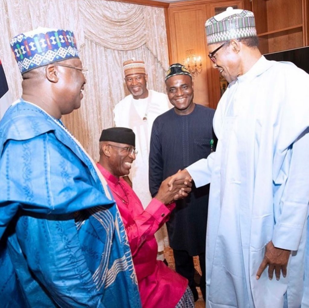 Omo-Agege kneeling to greet the Buhari