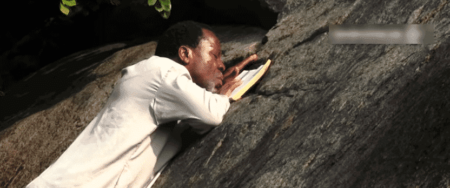 Nigerians react as Pastor T.B Joshua prays on the mountain
