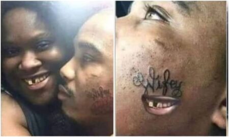 Man tattos his girlfriends dentition on his face