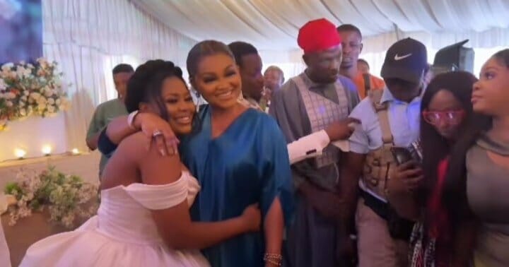 Mercy Aigbe and a bride