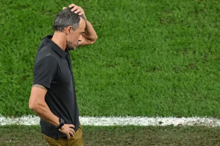 Spain fires head coach