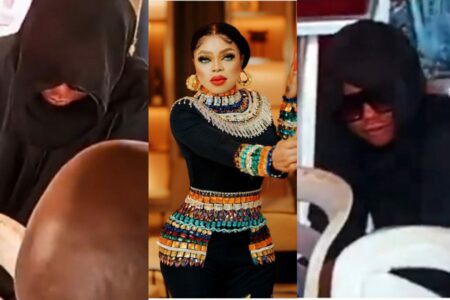 Bobrisky stirs reactions as he hides his face at father's burial