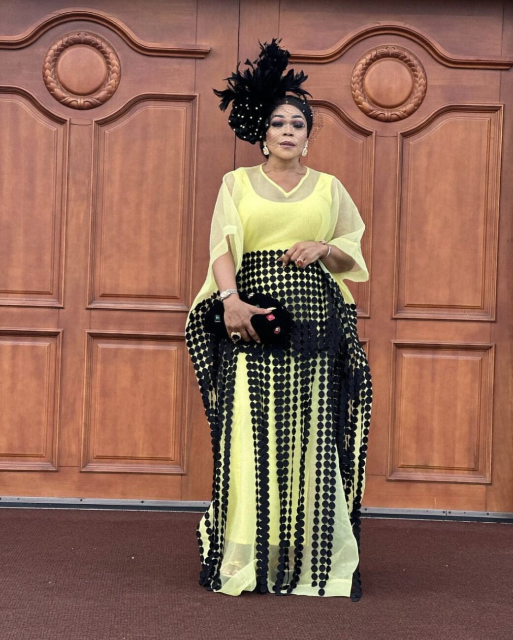 Yellow elegance: Shaffy Bello stuns in a yellow organza maxi dress.