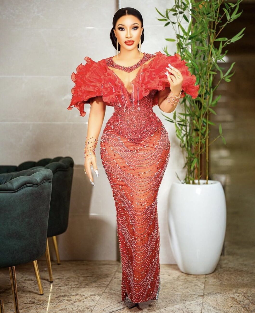 Tonto Dikeh in a dazzling red dress.