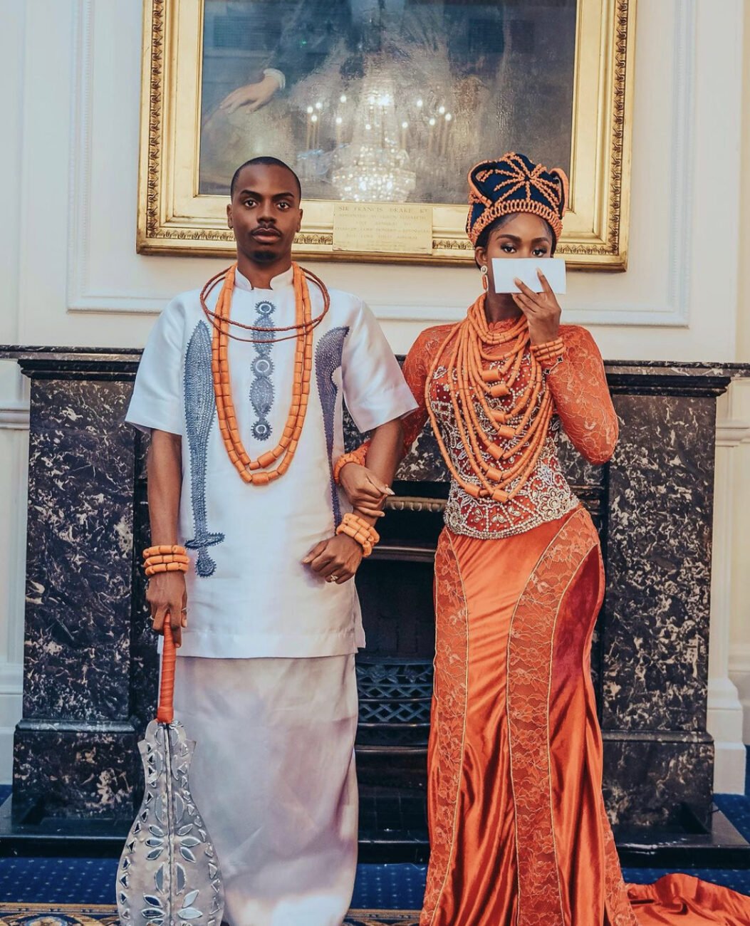 Enioluwa Adeoluwa and Priscilla Ojo in matching Edo/Benin cultural outfits.