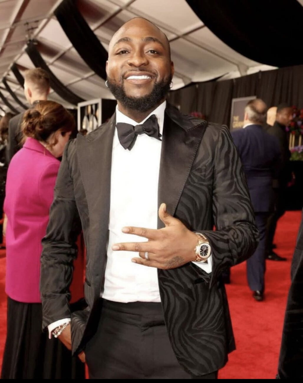 Davido in a black suit and bow-tie at the Grammys 2024.